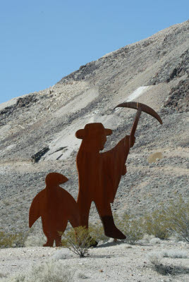 The Miner and his Penguin Buddy