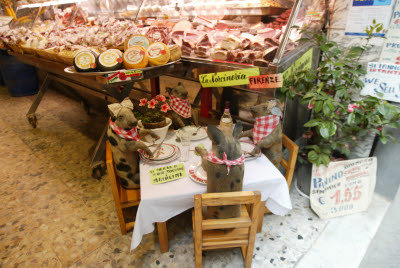 Pigs Hanging out that Butcher Shop