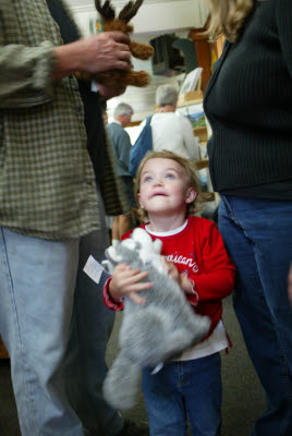 Emma negotiating for a larger toy at the gift shop