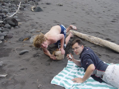 Alex and Mark crackin' coconuts