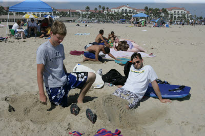 Alex and Mark playing in the Sand at Huntington Beach