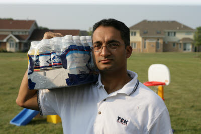 Vinay restocking the water