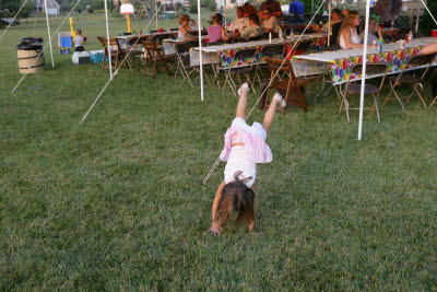 Sarah does cartwheels at Gunnar's birthday party