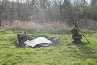 Garbage burning pit at farm in Montesano