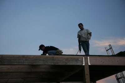 Lance and J.B. install loft tongue and groove flooring