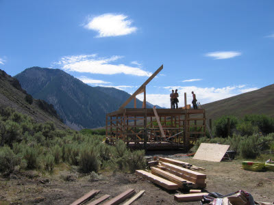 George works on cutting the rafters