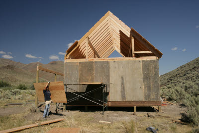 Putting on the siding