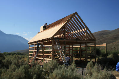 Putting on the roof sheeting