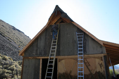 Measuring for the last piece of siding