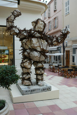 Large Man Statue Made of Boulders Held Together by Metal Rebar